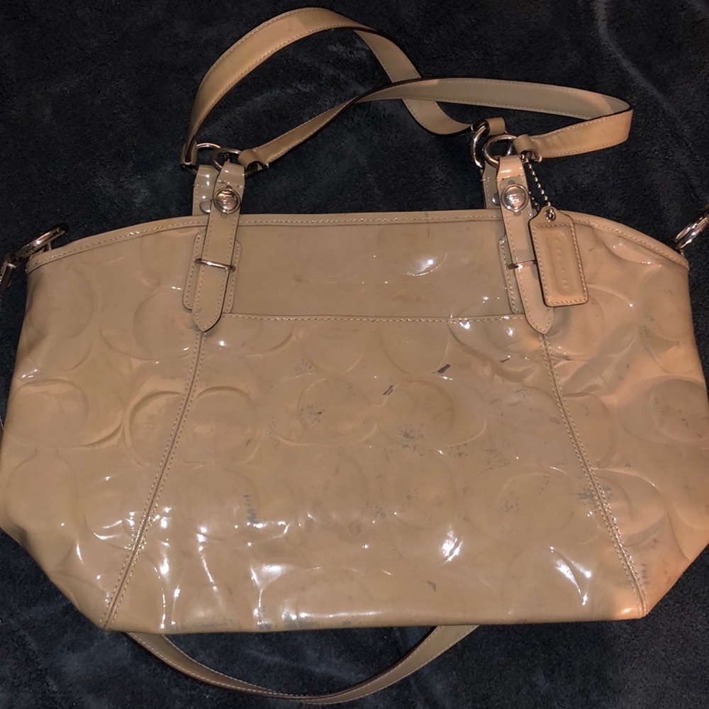 Tan Coach purse